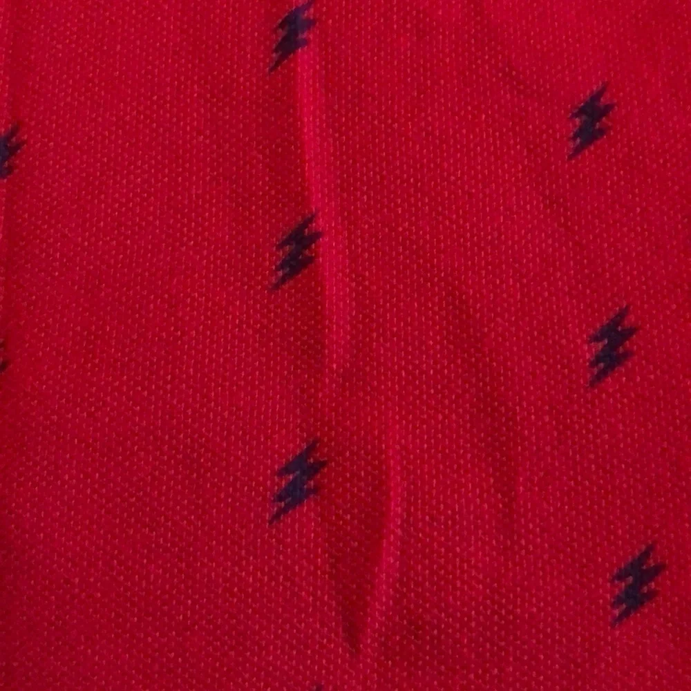 Old Navy boy’s red knit polo with lighting bold pattern size 8